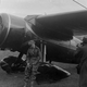Amelia Earhart sits on the wheel of her Vega 5B in Derry, Ireland after crossing the Atlantic Ocean alone. (Author unknown)